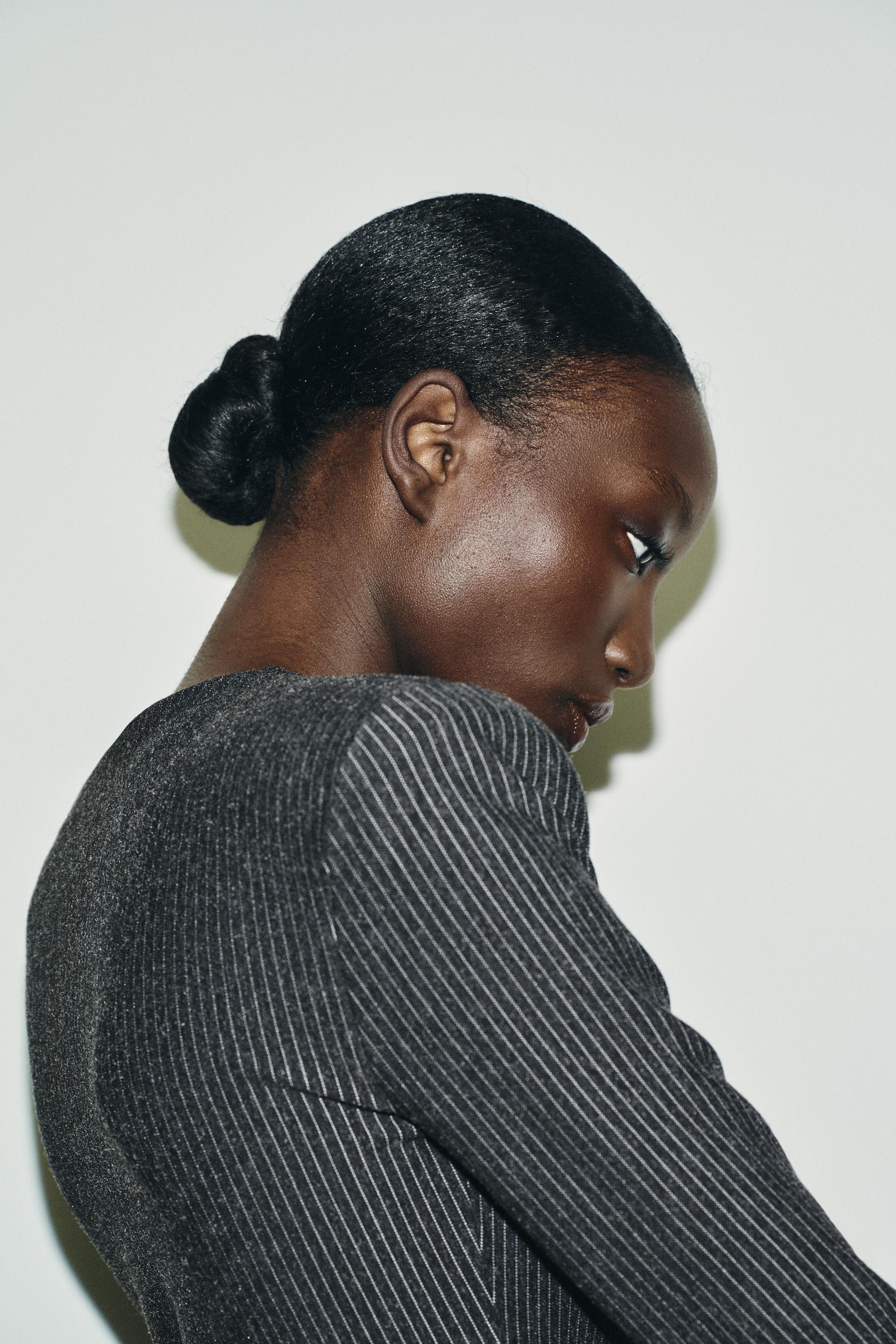 PINSTRIPED SHOULDER PAD TOP